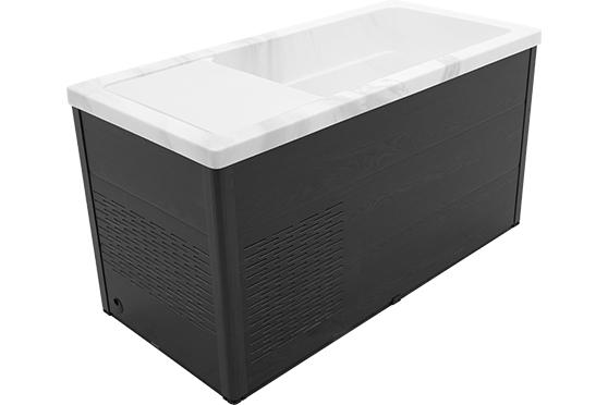 Bellagio Vastera one-person cold plunge in marble white with a dark cabinet